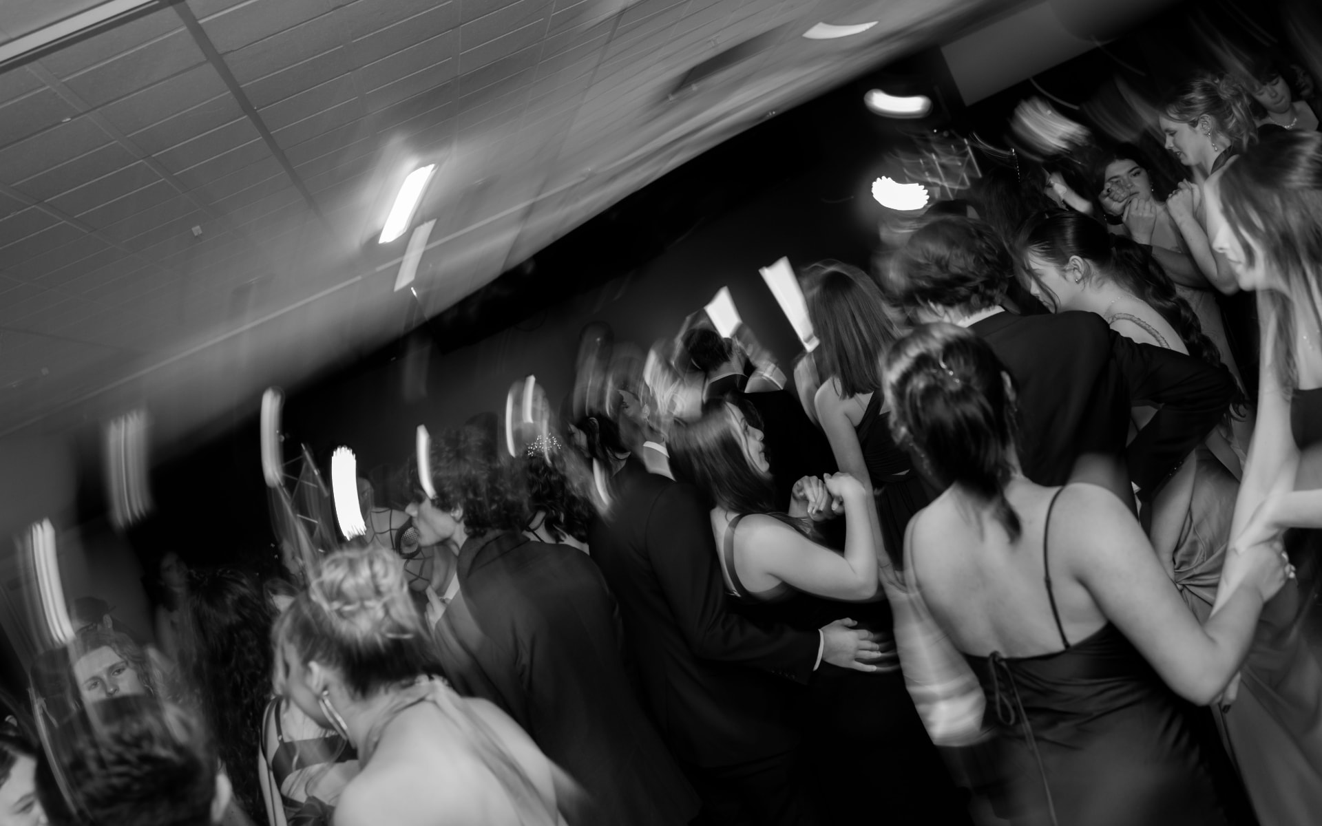 Guests dancing at a packed event in Aotearoa